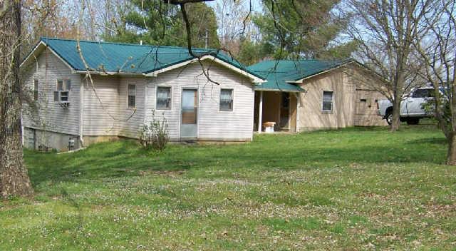 322 Dorris Road Portland, TN 37148 - Photo 1 of 8 a view of a house with a yard