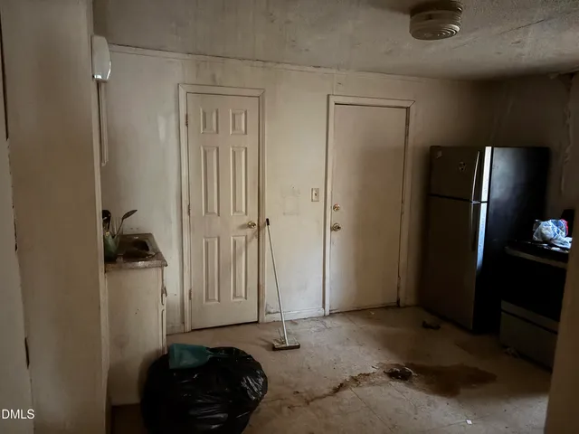 a room with a small space and a window