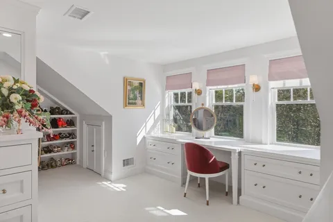 a room with furniture and a window