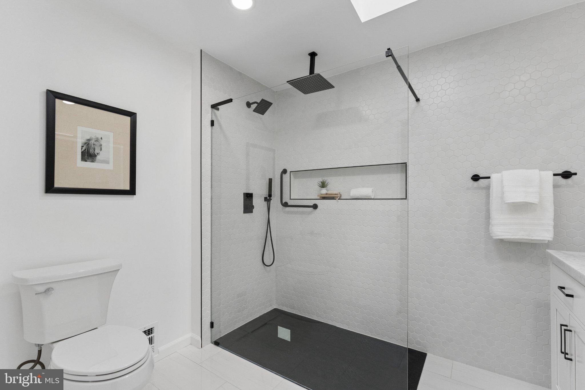 3219 Fox Mill Road Oakton, VA 22124 - Photo 34 of 87 Sleek modern bathroom oasis.