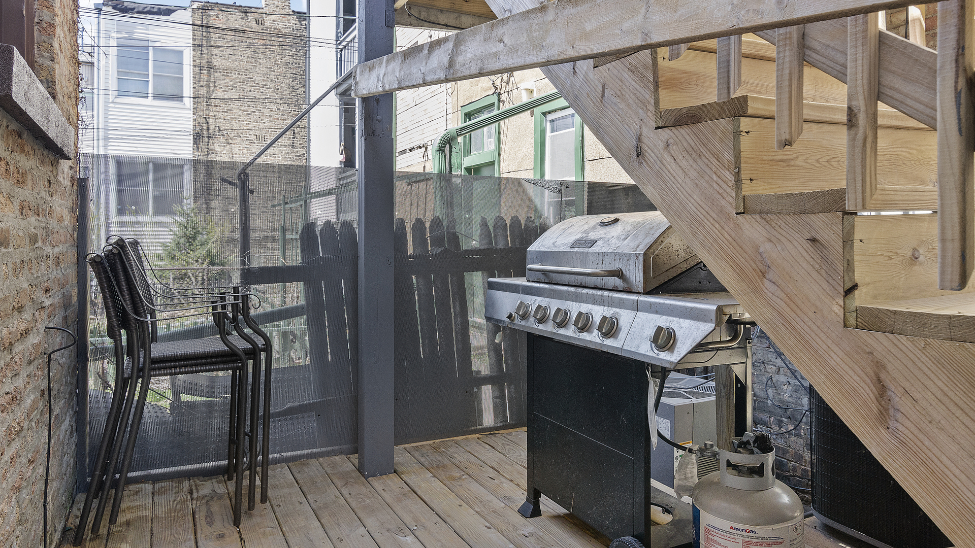 1645 West Irving Park Road Chicago, IL 60613 - Photo 26 of 33 a view of balcony with wooden floor