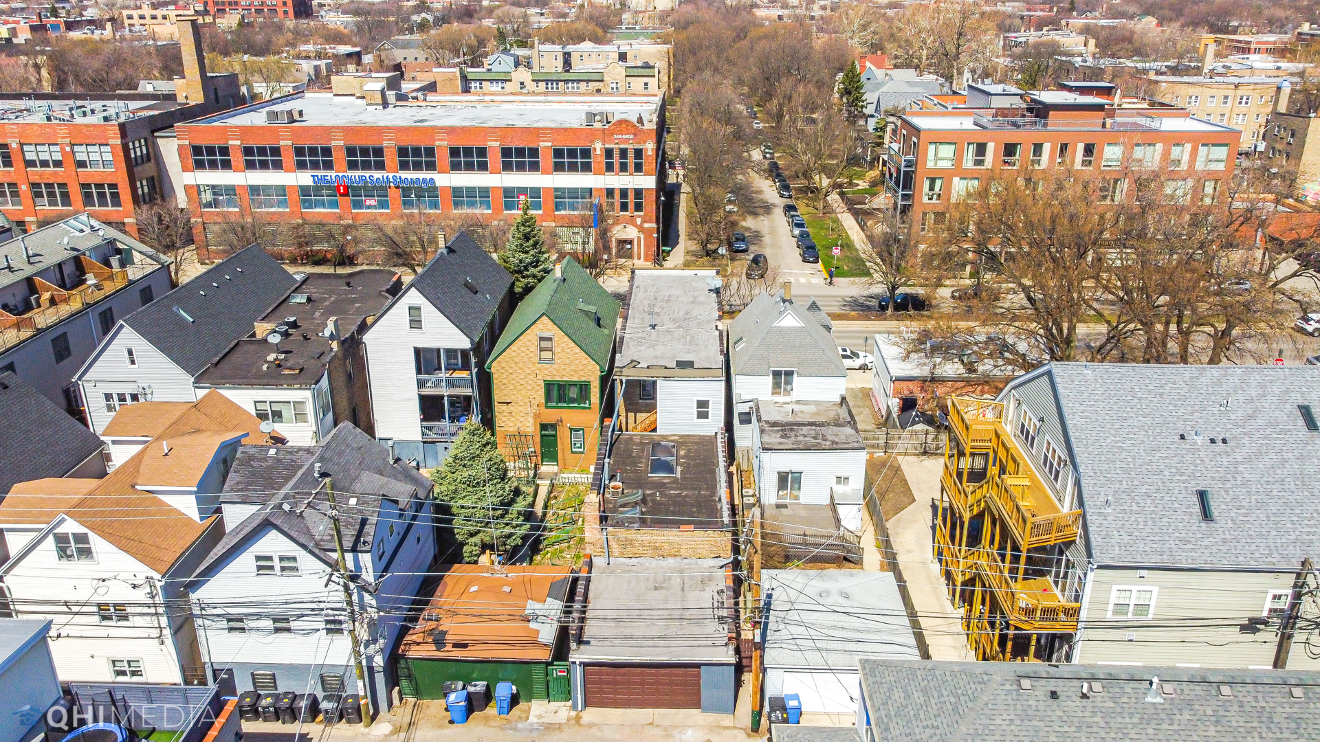 1645 West Irving Park Road Chicago, IL 60613 - Photo 28 of 33 an aerial view of residential houses with outdoor space