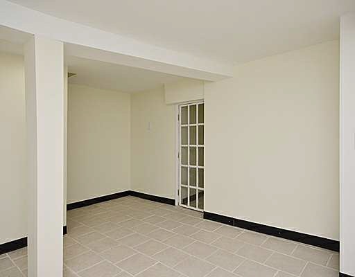 1645 West Irving Park Road Chicago, IL 60613 - Photo 10 of 33 an empty room with a door