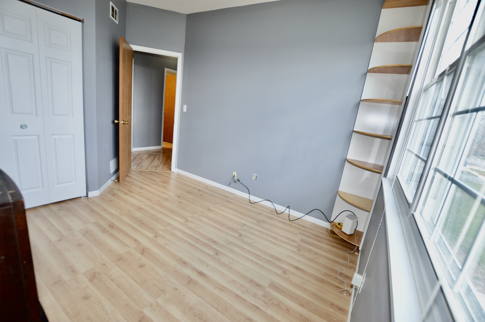 2001 Pine Drive McHenry, IL 60051 - Photo 11 of 19 a view of an empty room and wooden floor