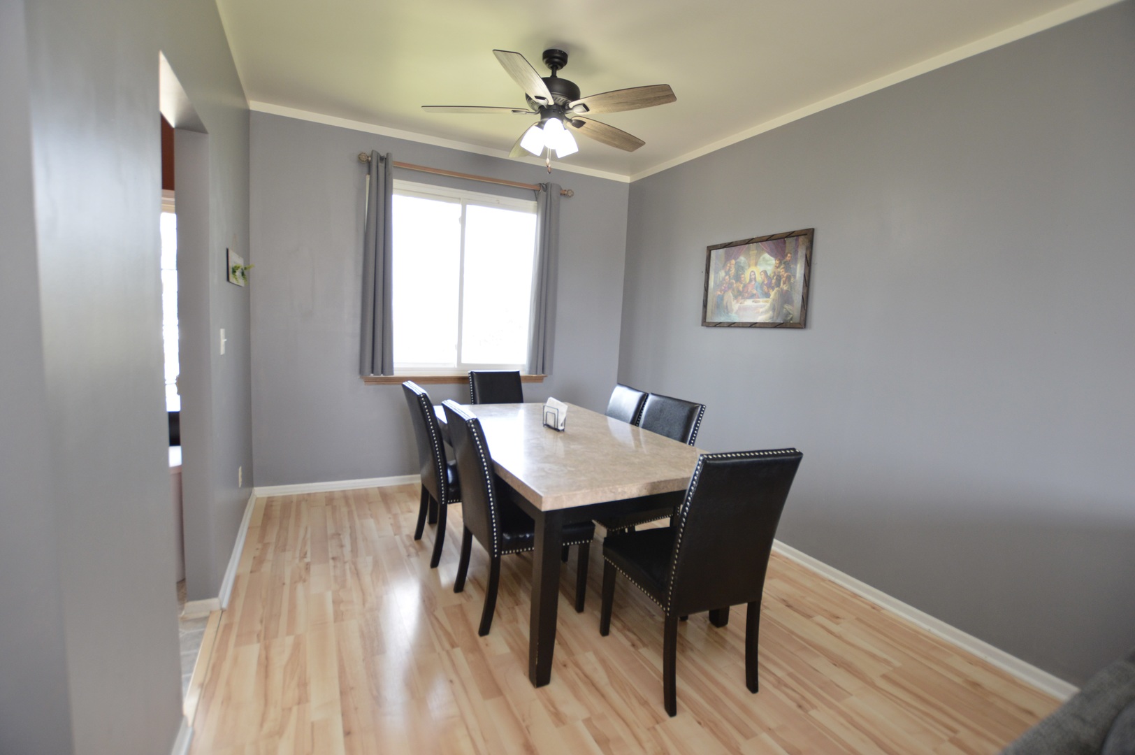 2001 Pine Drive McHenry, IL 60051 - Photo 6 of 19 a view of a dining room with furniture window and wooden floor
