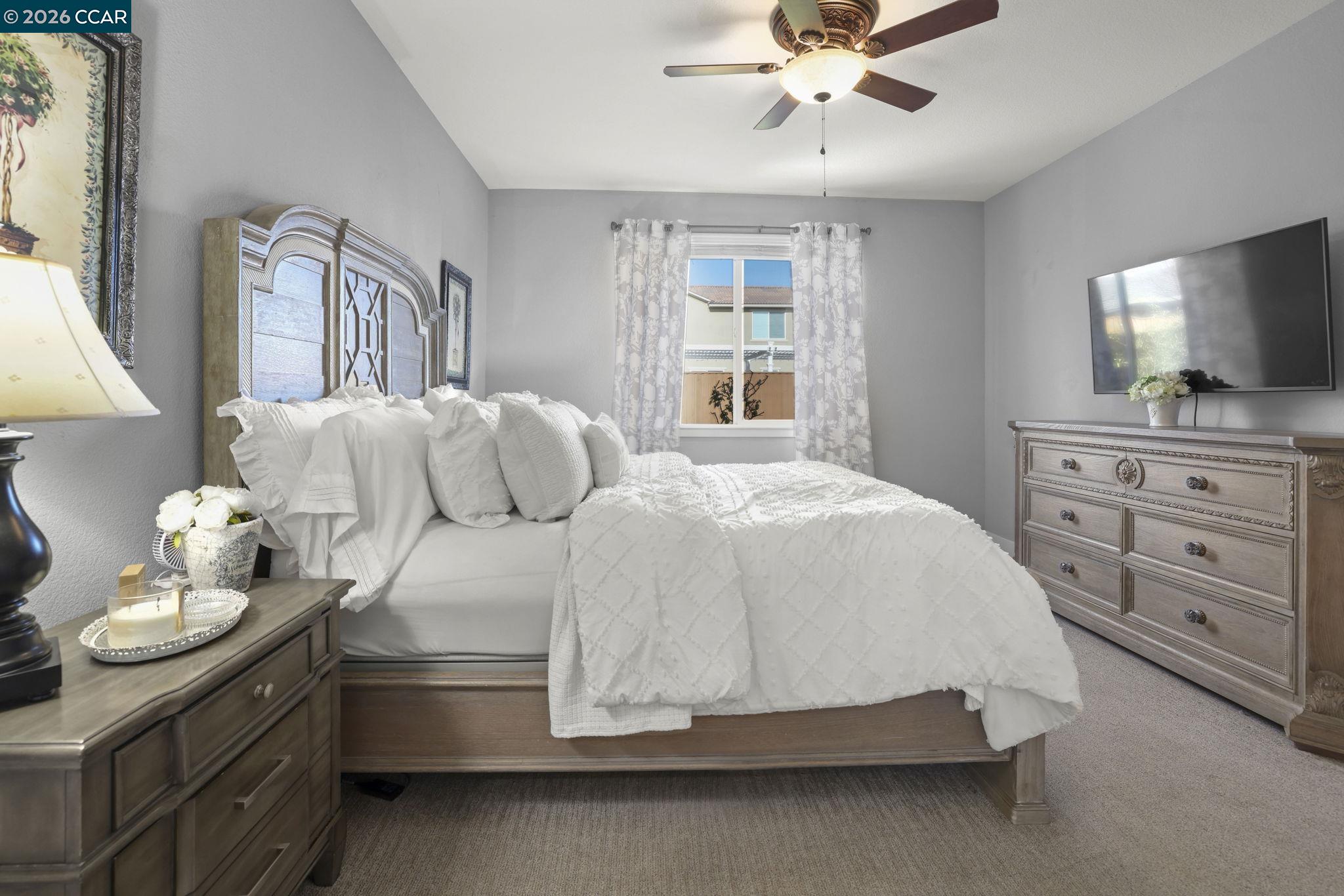 5245 Medea Way Antioch, CA 94531 - Photo 11 of 28 a spacious bedroom with a bed and window