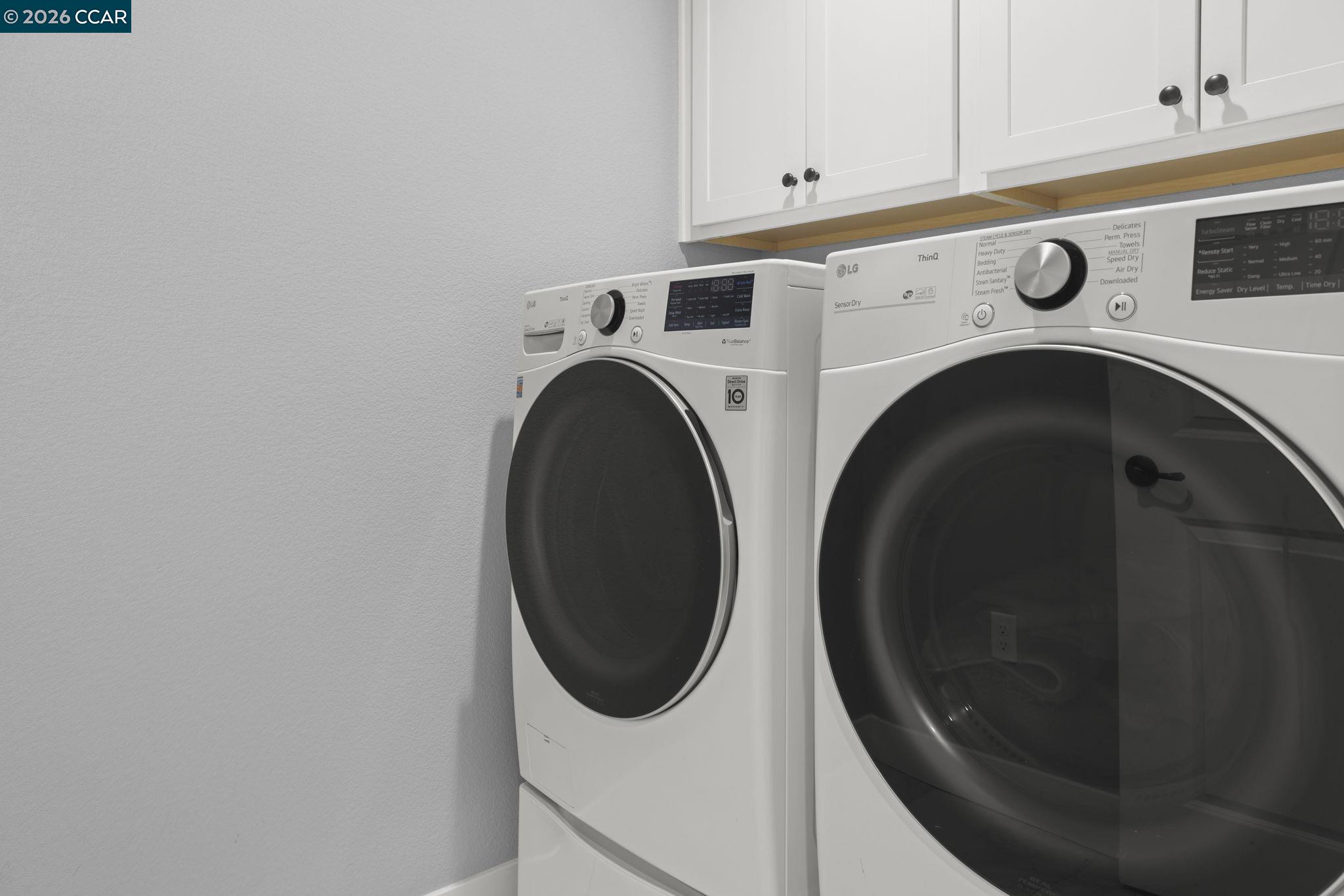 5245 Medea Way Antioch, CA 94531 - Photo 16 of 28 a utility room with dryer and washer