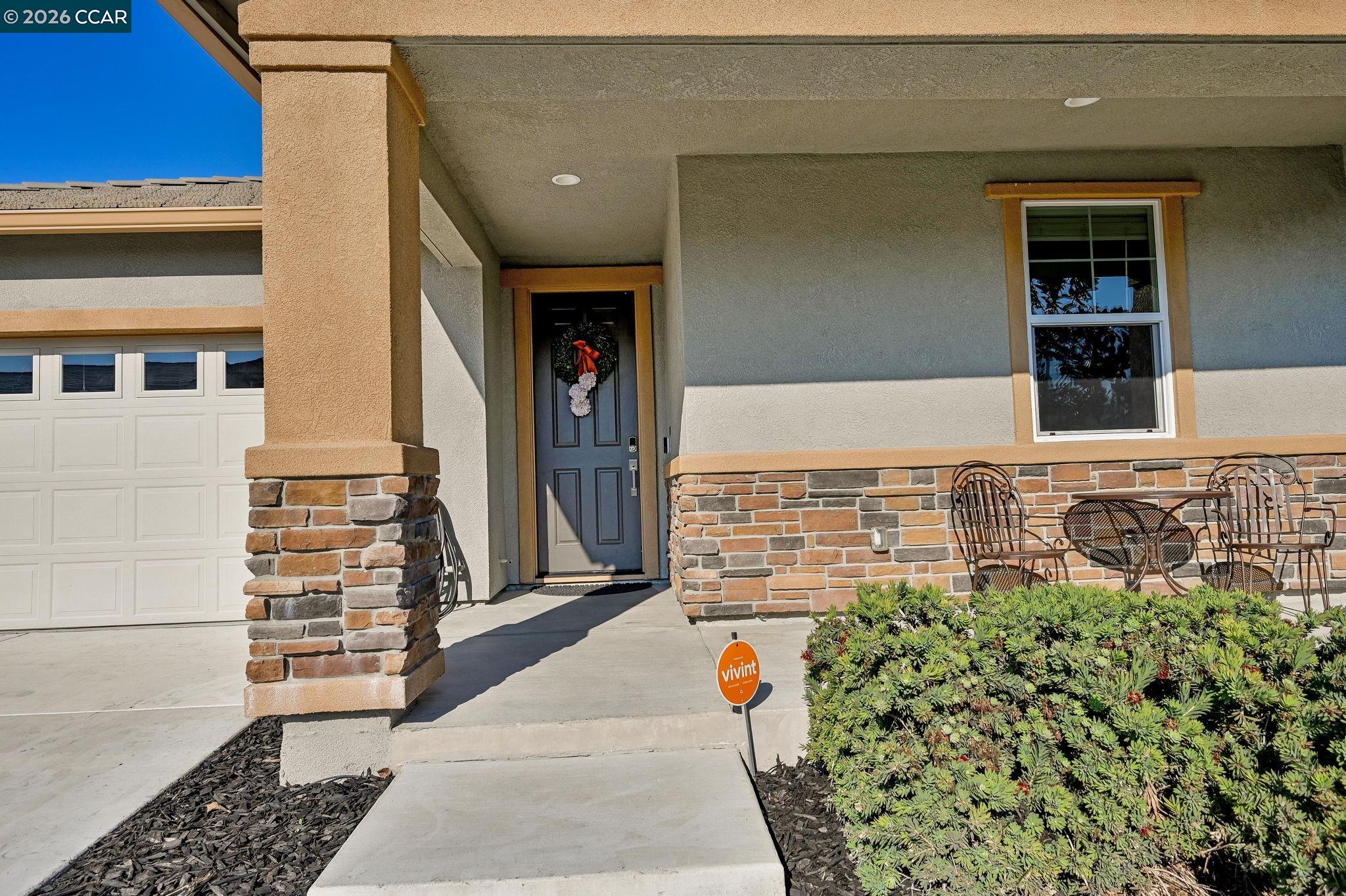 5245 Medea Way Antioch, CA 94531 - Photo 3 of 28 a view of a brick house with large windows