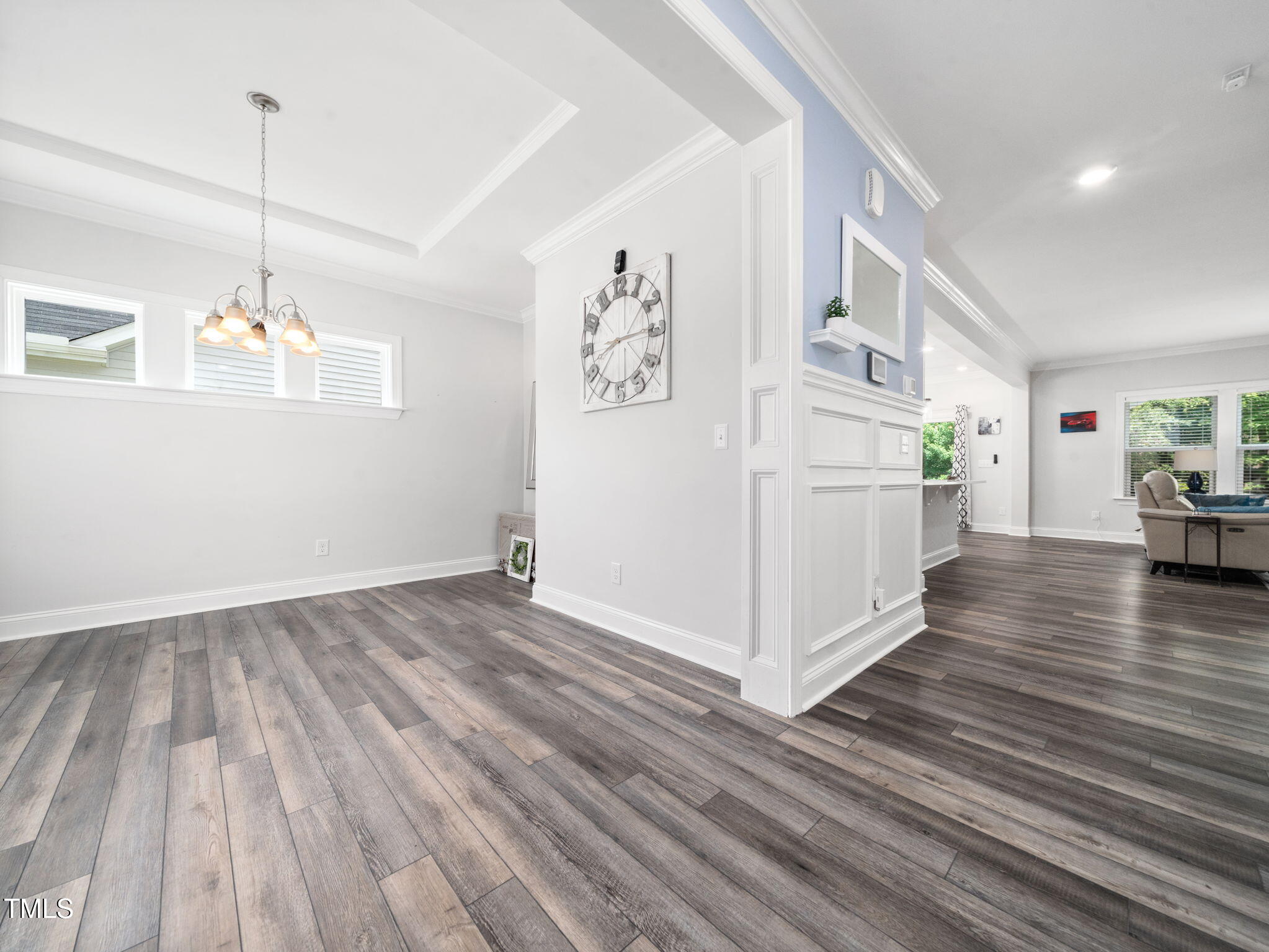 3213 Douglas Fir Road Raleigh, NC 27616 - Photo 12 of 44 a view of a livingroom with wooden floor