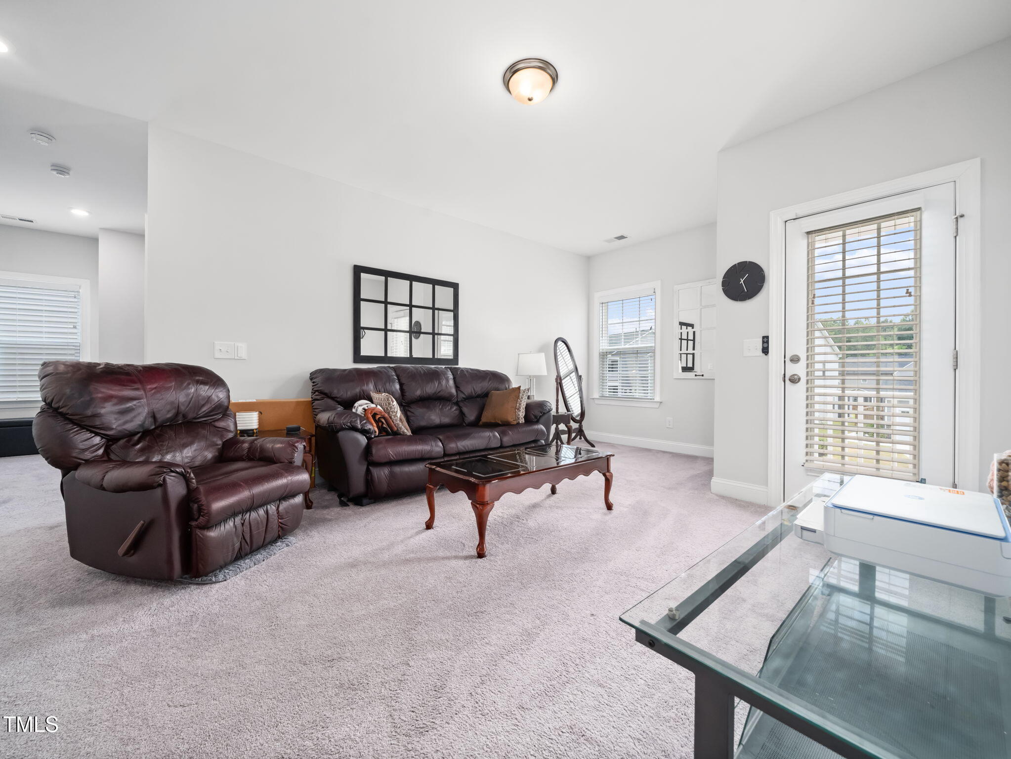3213 Douglas Fir Road Raleigh, NC 27616 - Photo 17 of 44 a living room with furniture and a window