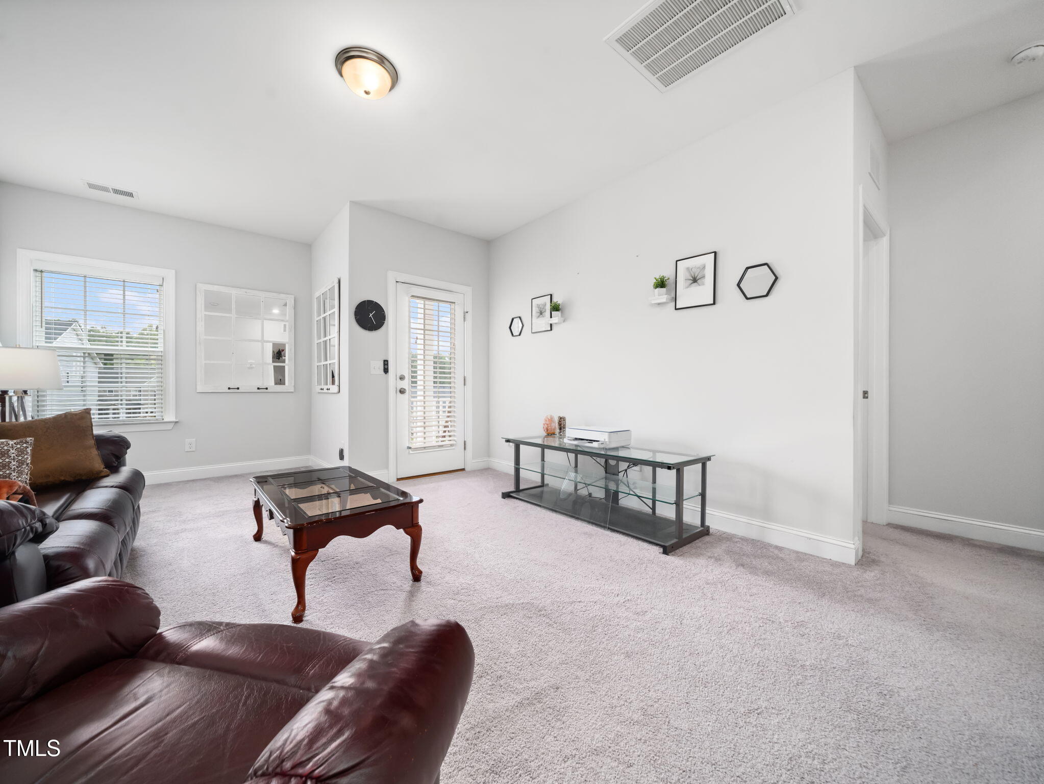 3213 Douglas Fir Road Raleigh, NC 27616 - Photo 18 of 44 a living room with furniture