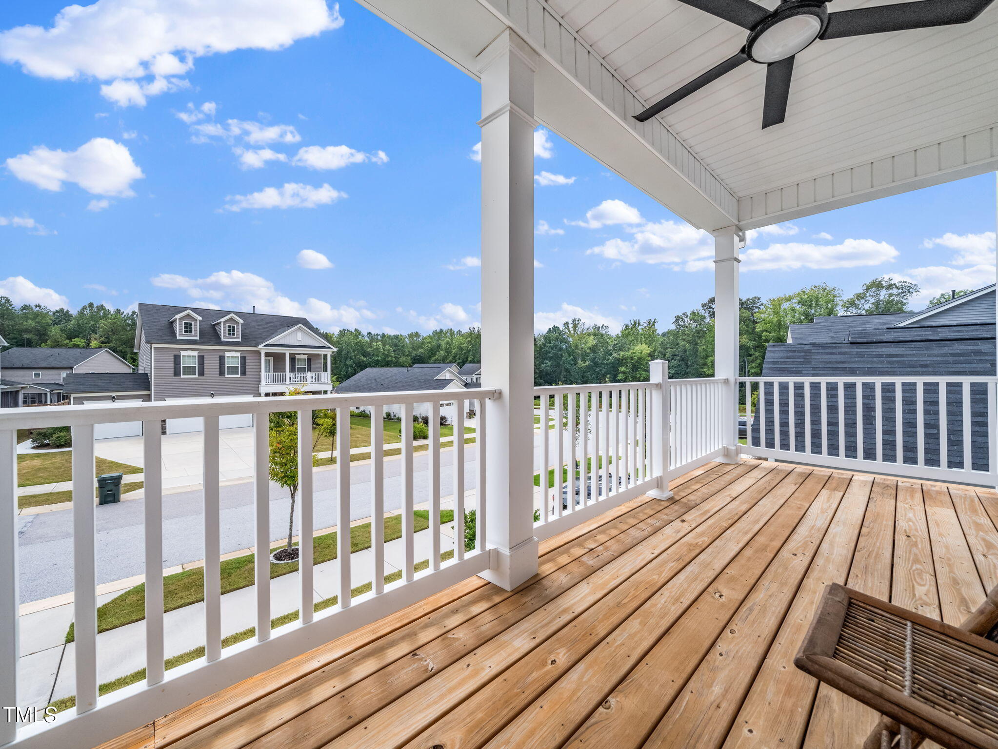 3213 Douglas Fir Road Raleigh, NC 27616 - Photo 28 of 44 a view of balcony with wooden floor and fence