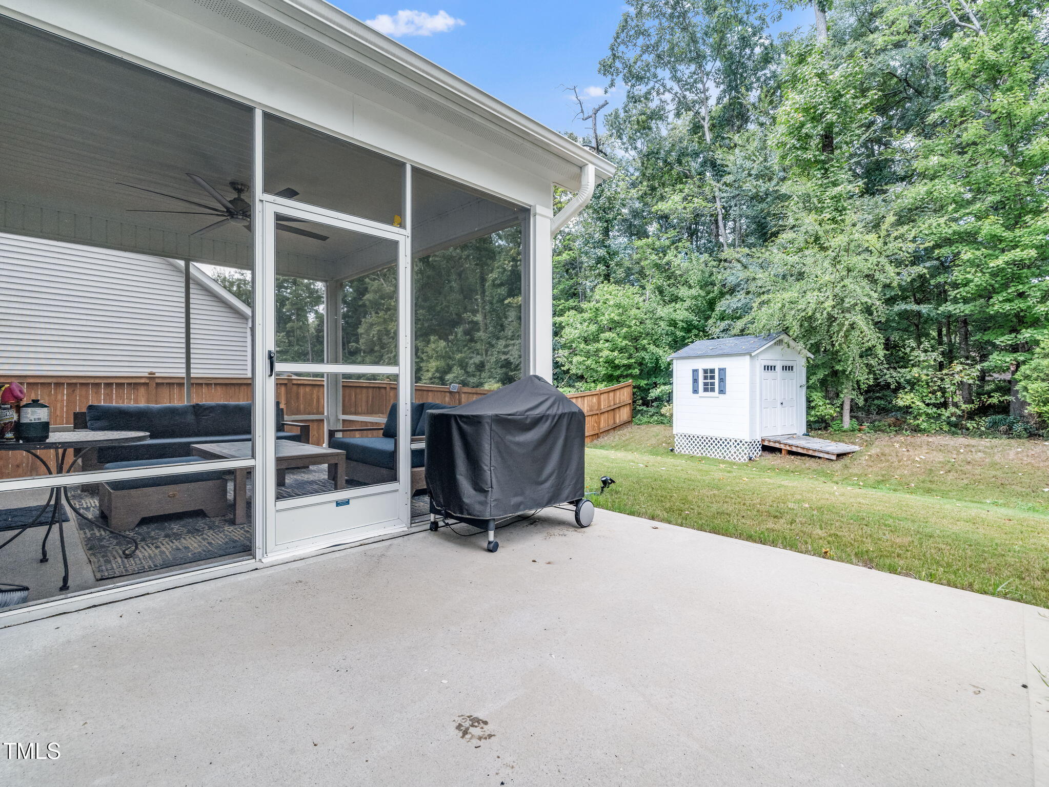 3213 Douglas Fir Road Raleigh, NC 27616 - Photo 29 of 44 a view of backyard with outdoor seating and green space