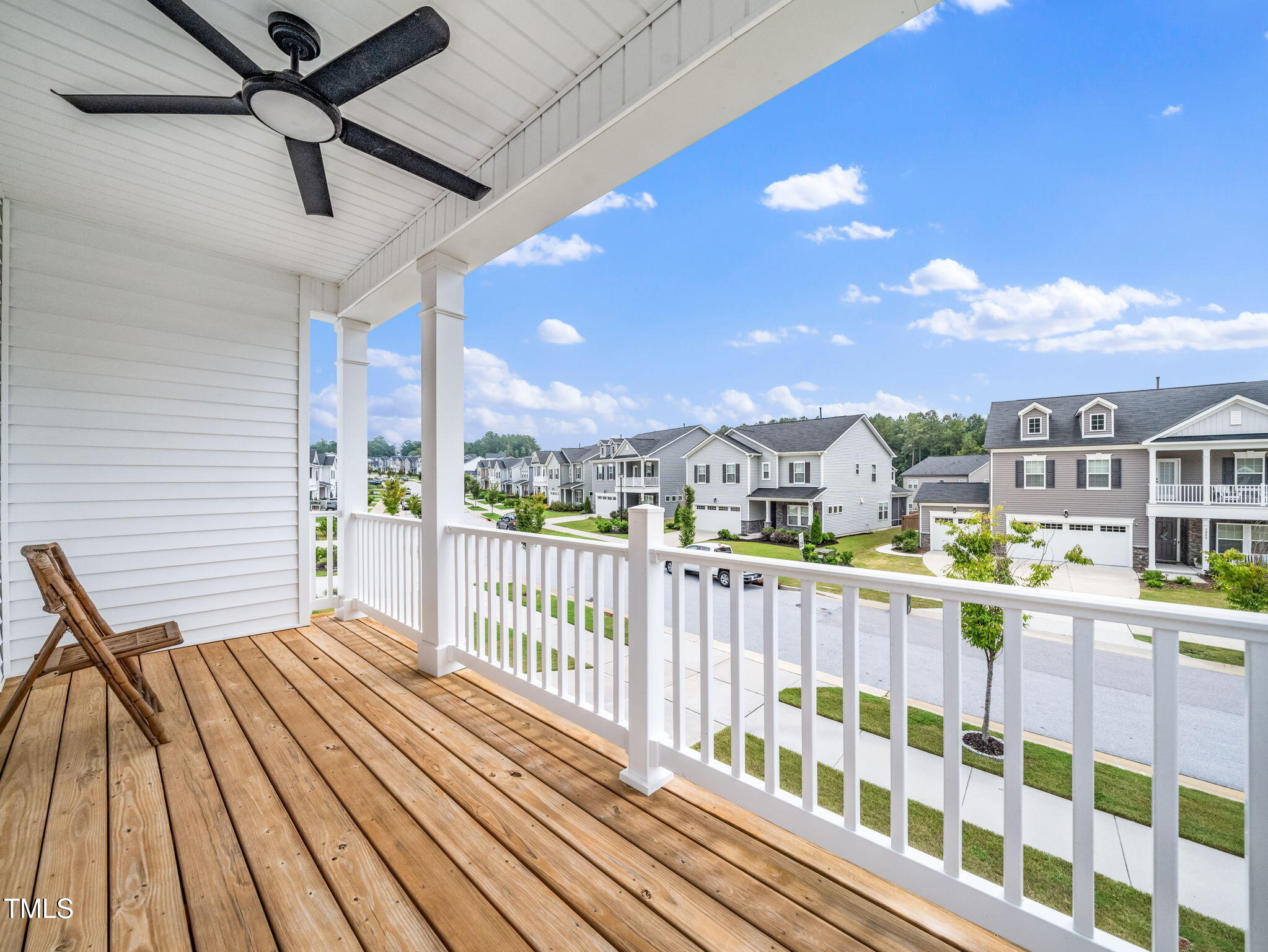 3213 Douglas Fir Road Raleigh, NC 27616 - Photo 3 of 44 a view of a balcony with wooden floor