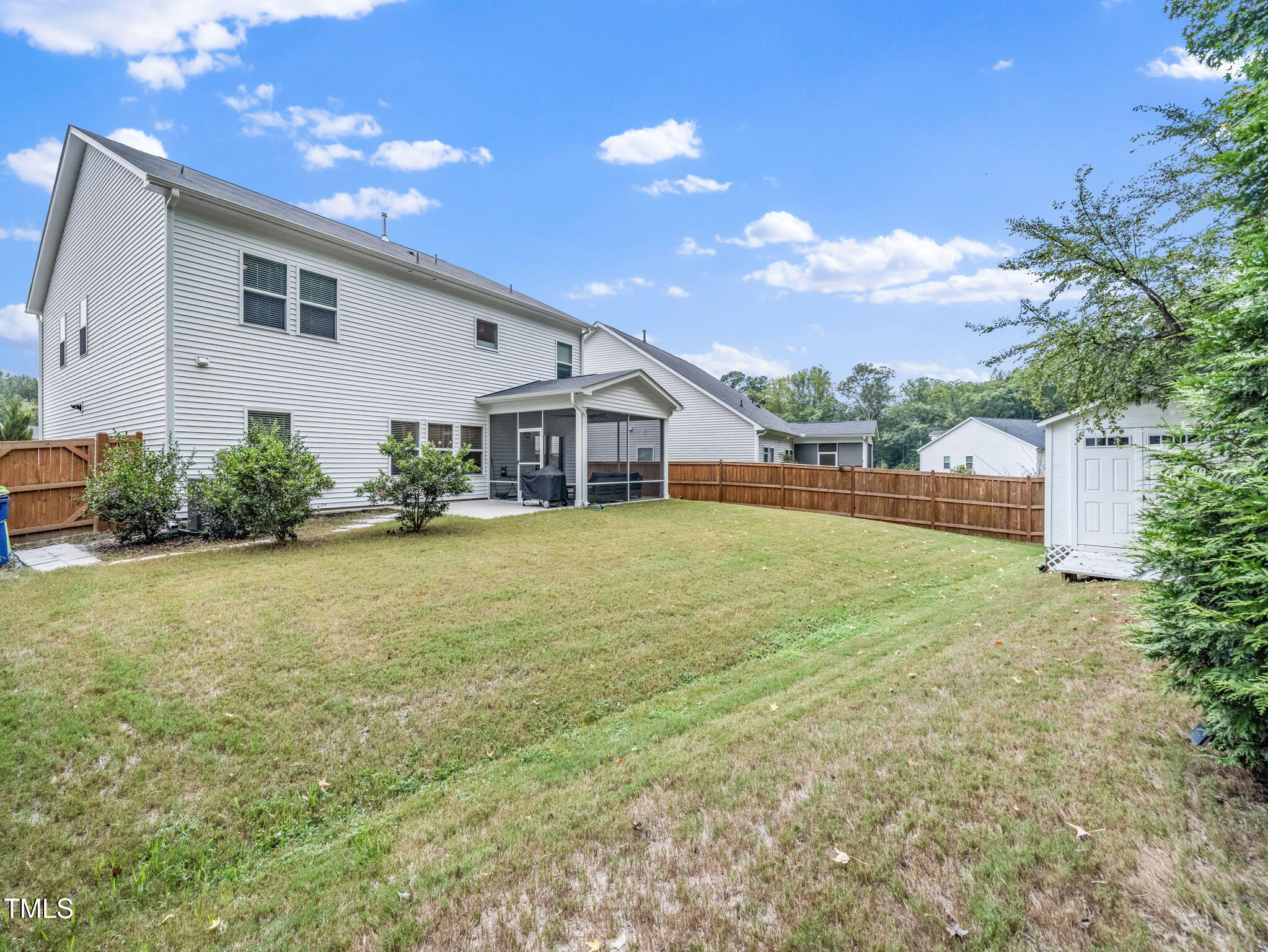 3213 Douglas Fir Road Raleigh, NC 27616 - Photo 31 of 44 a view of a house with backyard and sitting area