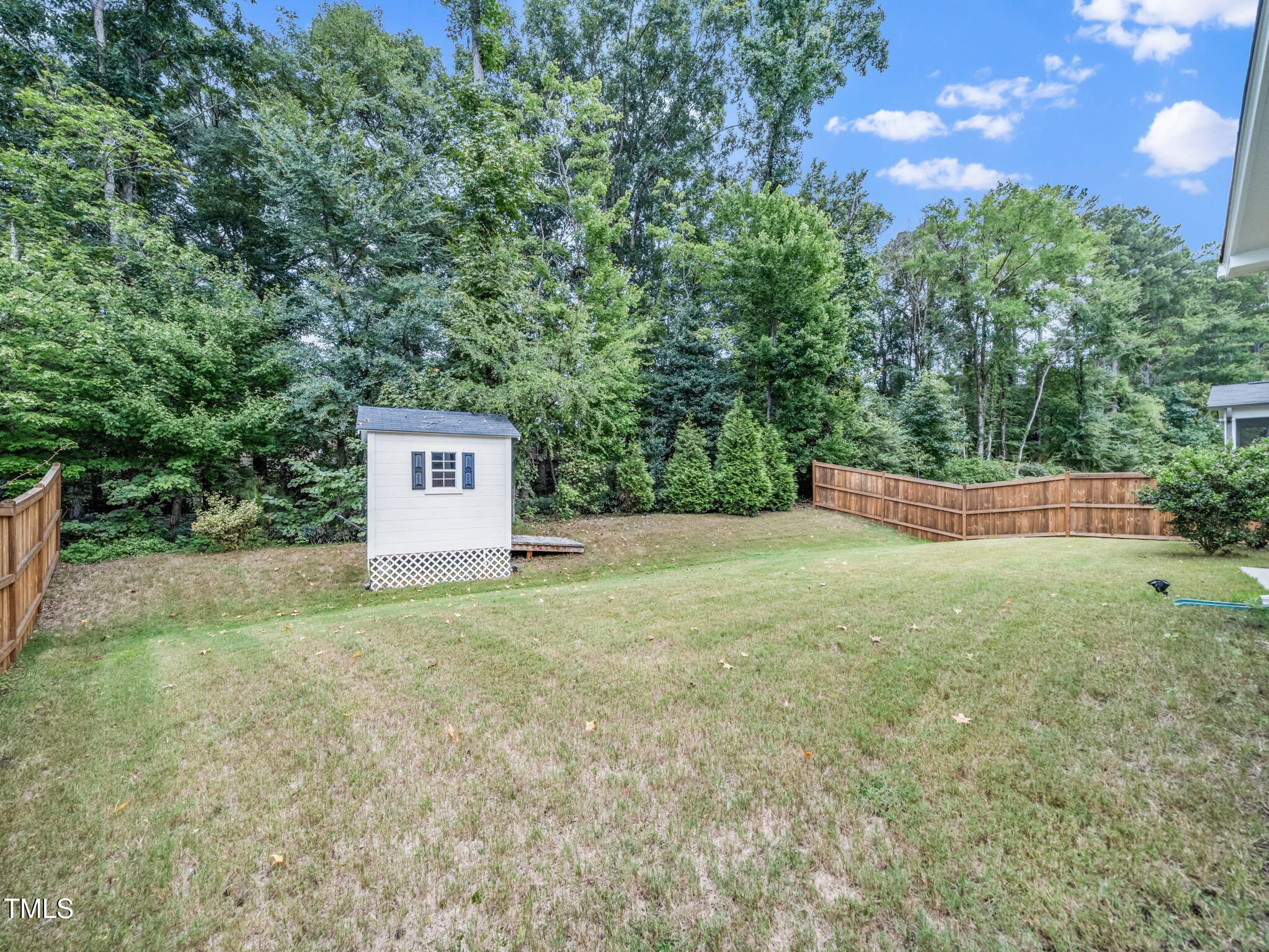 3213 Douglas Fir Road Raleigh, NC 27616 - Photo 33 of 44 a view of a back yard