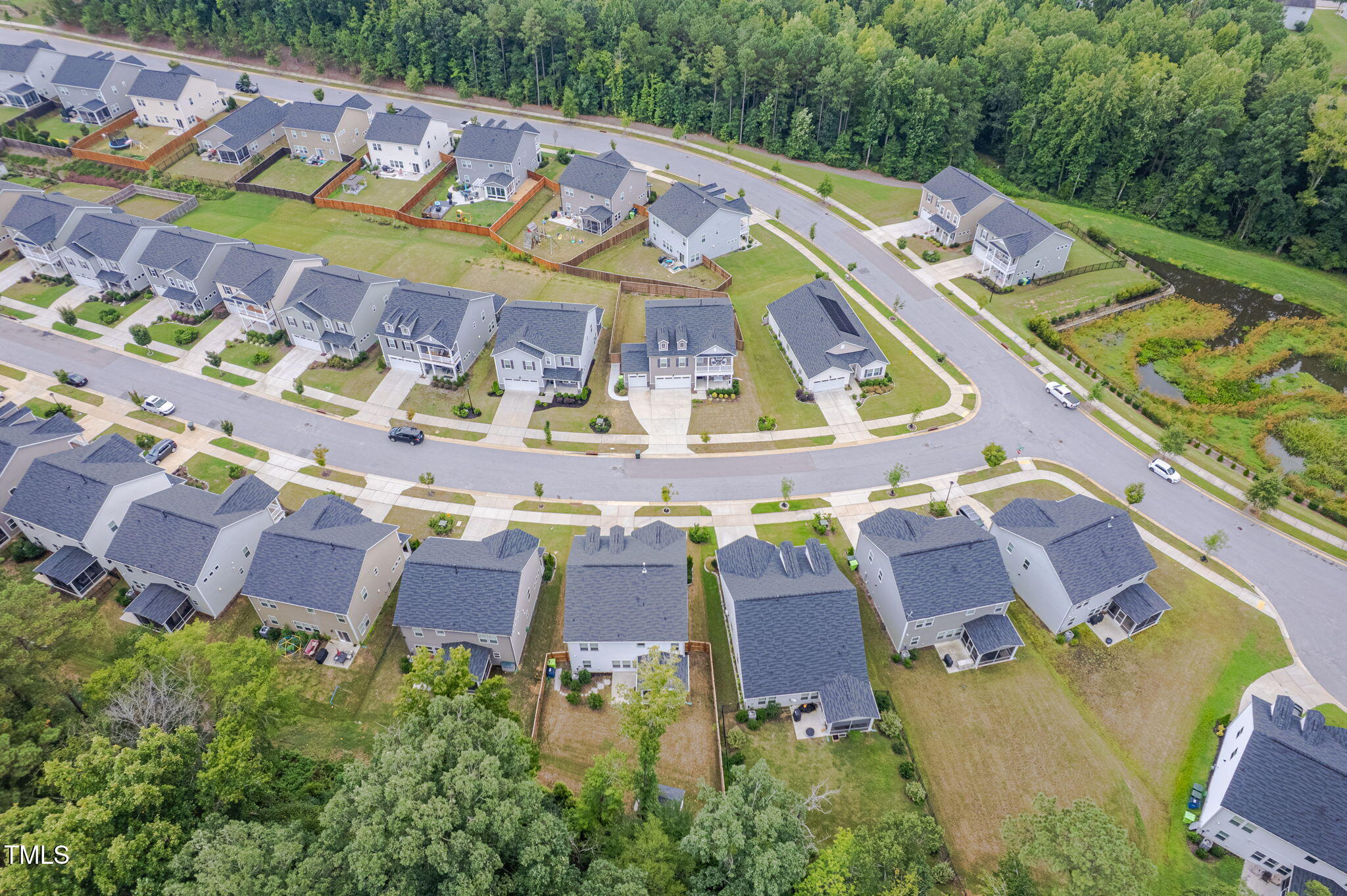 3213 Douglas Fir Road Raleigh, NC 27616 - Photo 38 of 44 an aerial view of a house with a swimming pool patio and outdoor seating