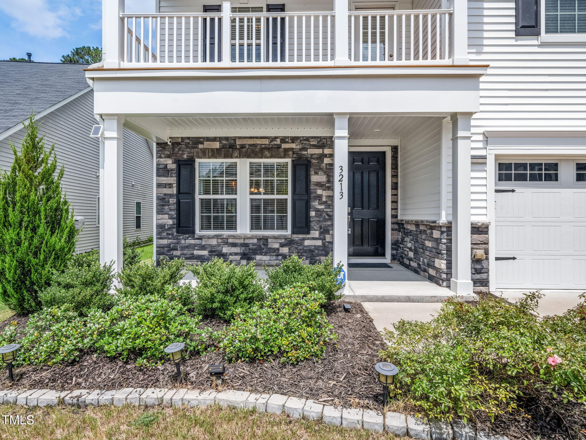 3213 Douglas Fir Road Raleigh, NC 27616 - Photo 39 of 44 front view of a house with potted plants