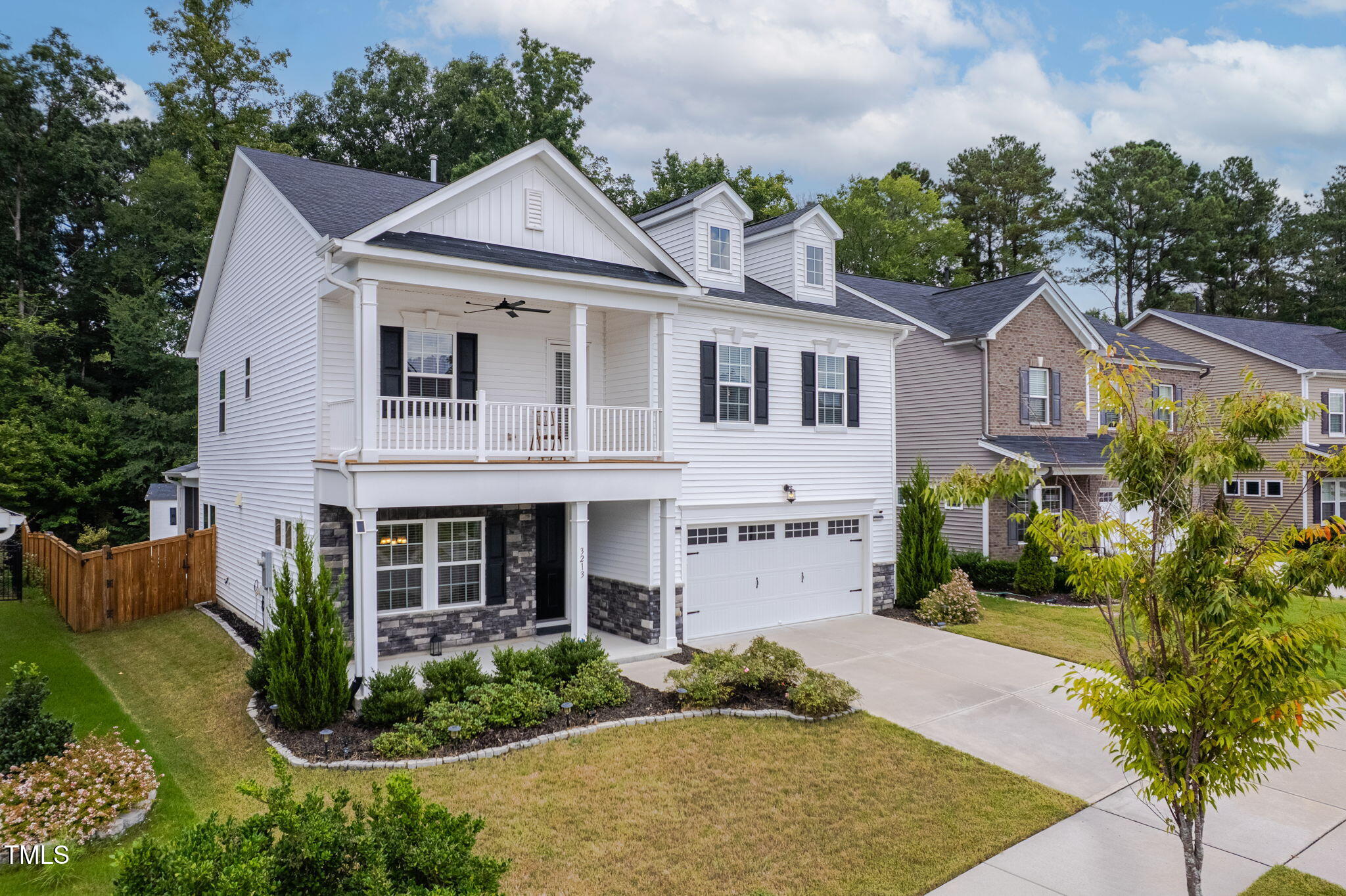 3213 Douglas Fir Road Raleigh, NC 27616 - Photo 41 of 44 a front view of a house with garden