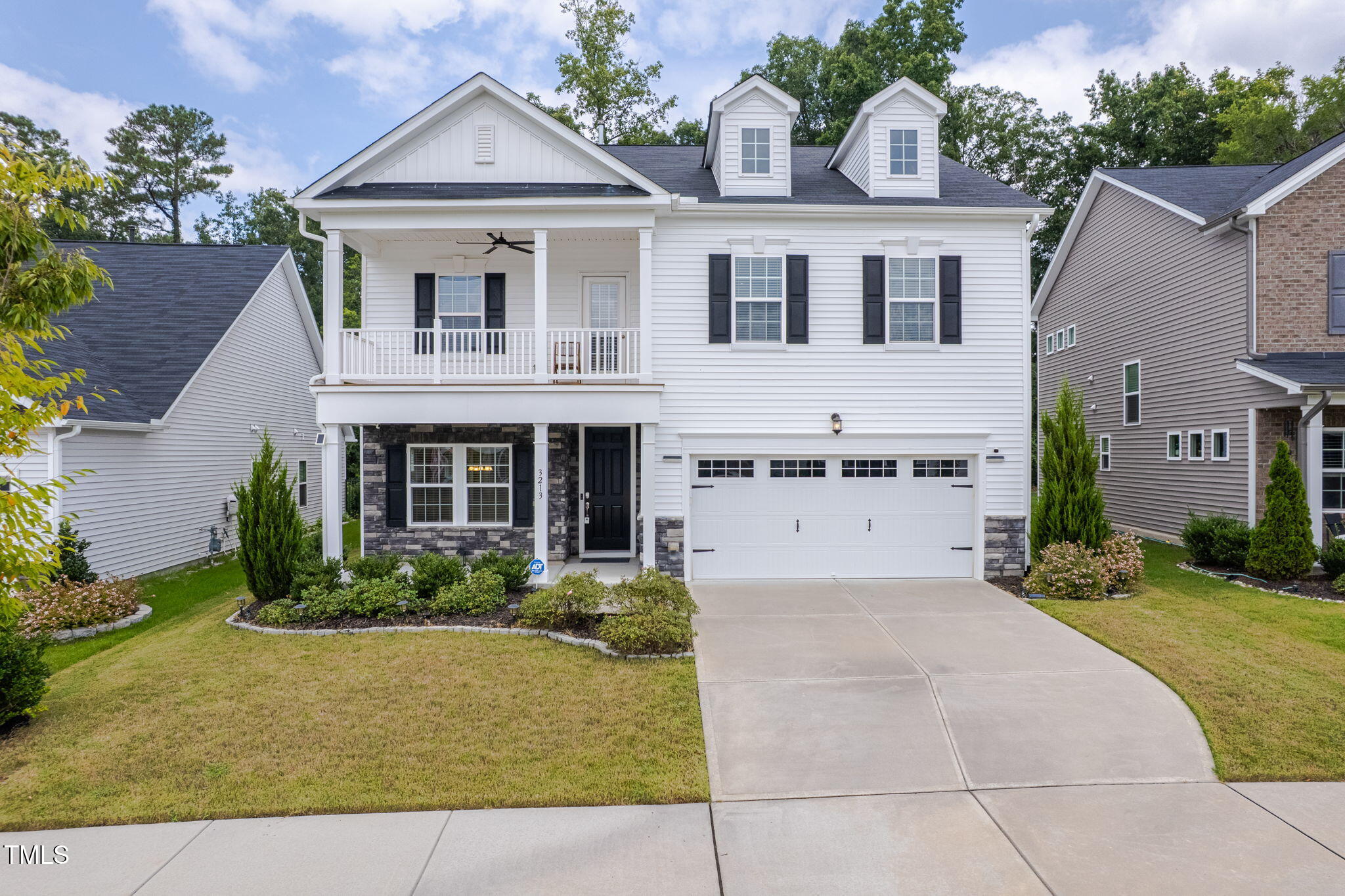 3213 Douglas Fir Road Raleigh, NC 27616 - Photo 42 of 44 front view of a house with a yard