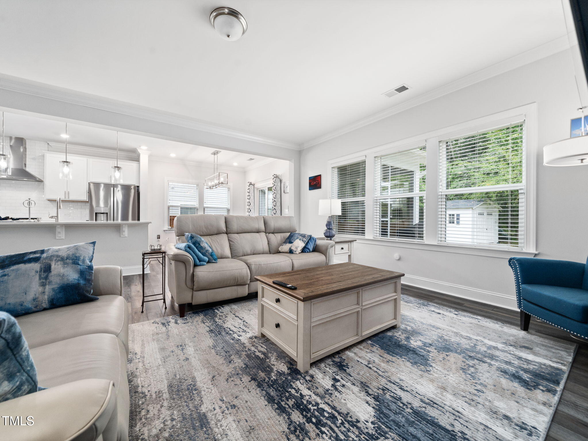 3213 Douglas Fir Road Raleigh, NC 27616 - Photo 9 of 44 a living room with furniture and a large window
