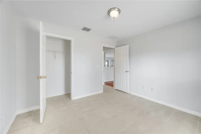 an empty room with an entryway