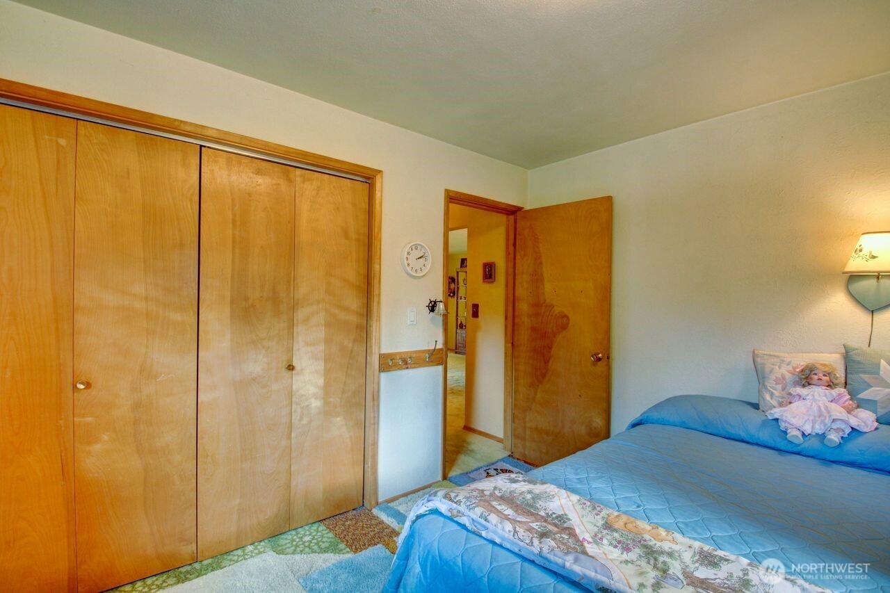 2310 Alison Avenue Mount Vernon, WA 98273 - Photo 23 of 39 a bedroom with a bed and a shower