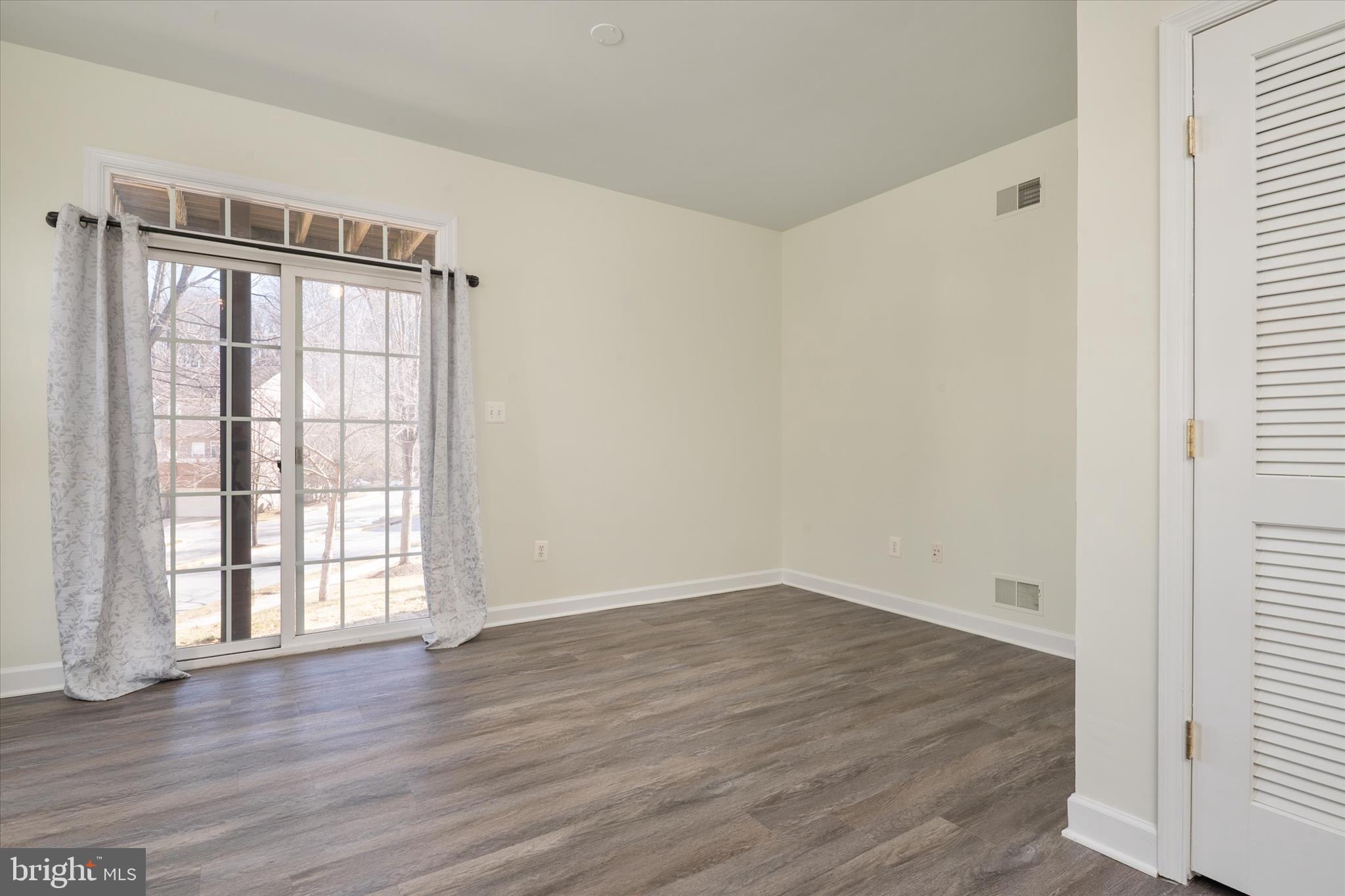 8129 Mississippi Road Laurel, MD 20724 - Photo 27 of 34 Basement with sliders to the backyard!