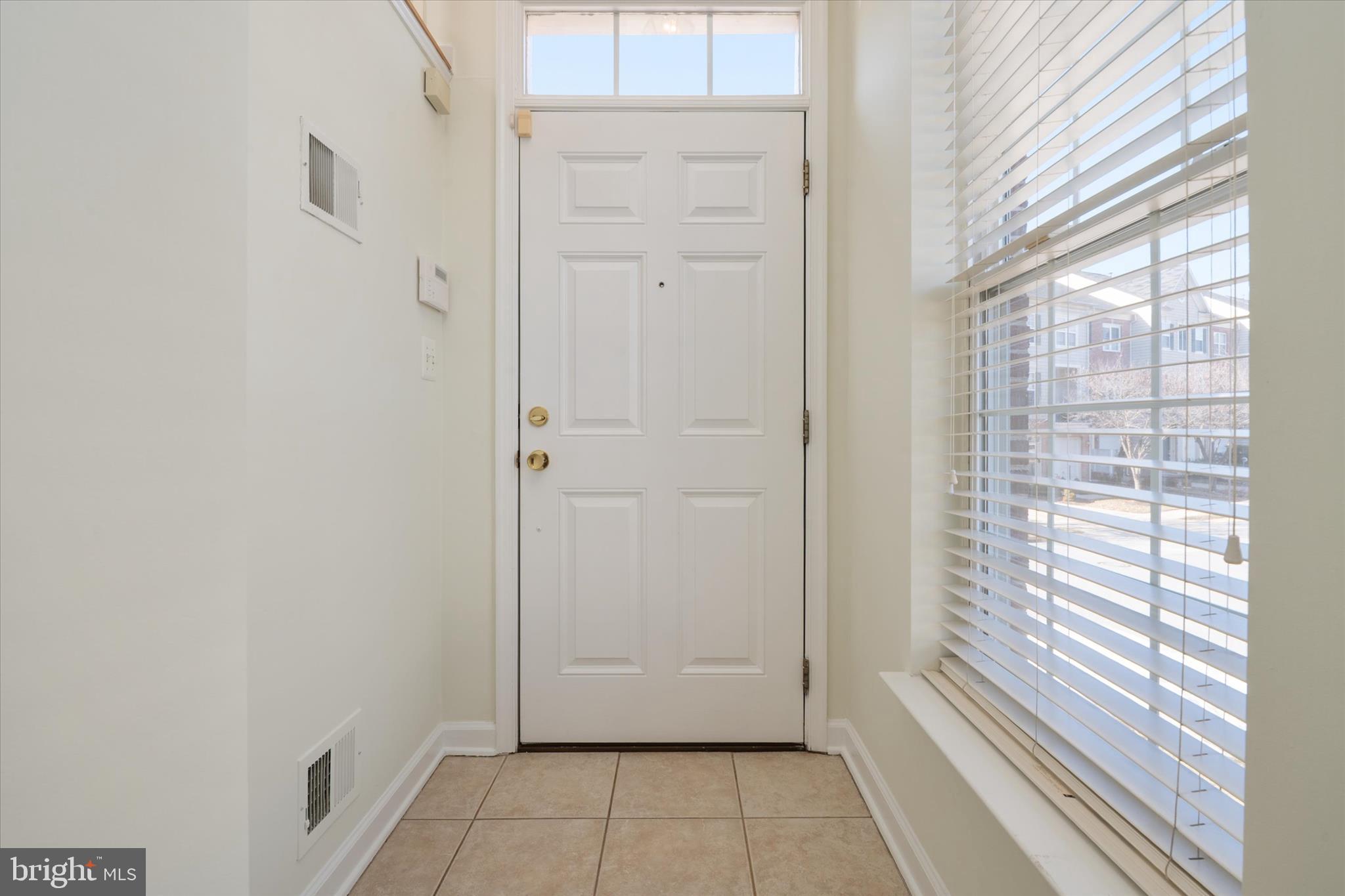 8129 Mississippi Road Laurel, MD 20724 - Photo 5 of 34 Bright & sunny entrance foyer!
