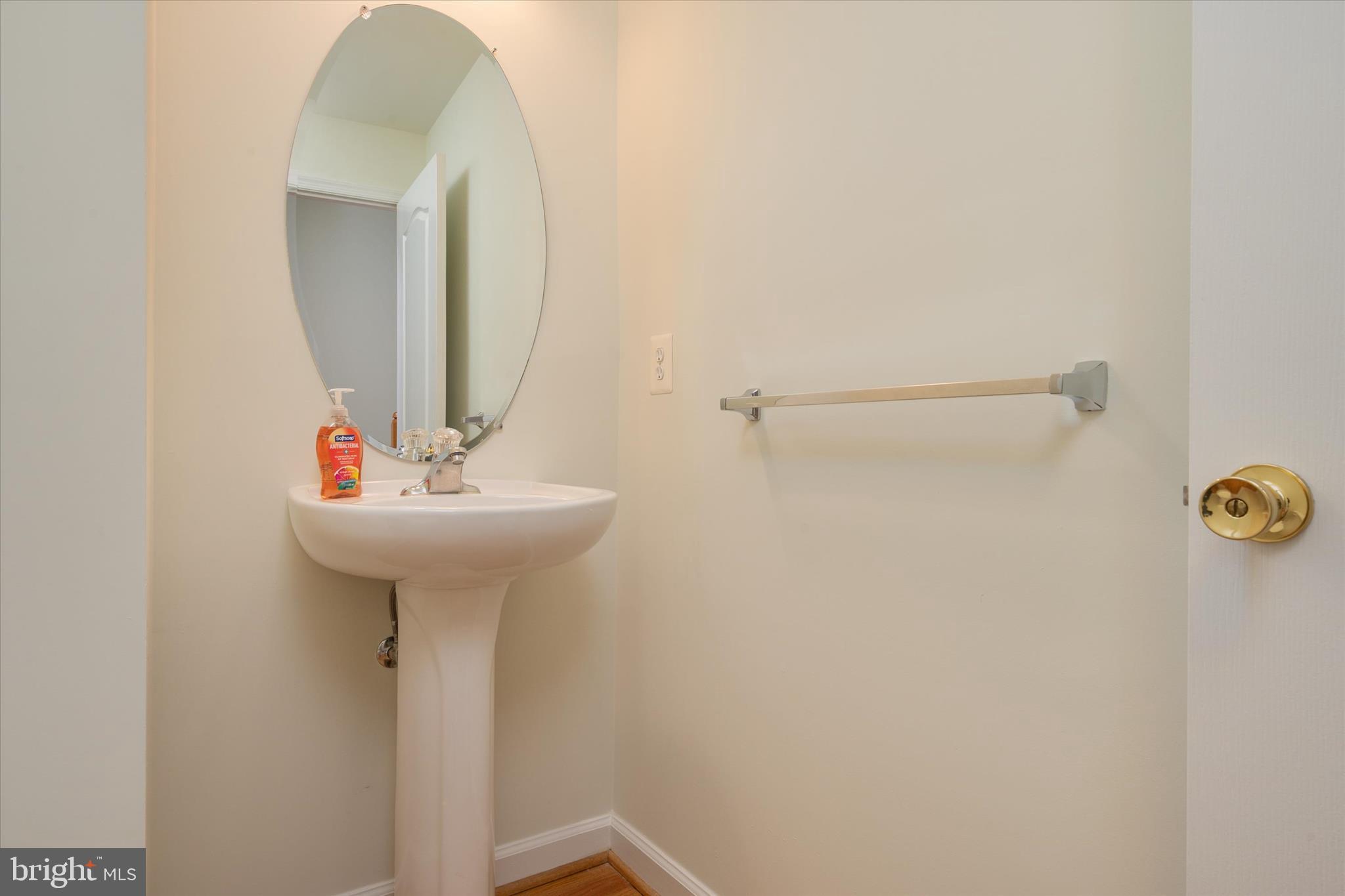 8129 Mississippi Road Laurel, MD 20724 - Photo 9 of 34 Mian level powder room.