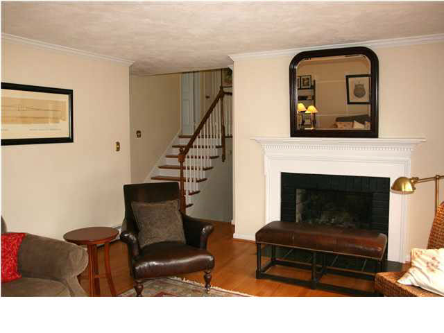 118 Alderman Road Charlottesville, VA 22903 - Photo 4 of 16 a living room with furniture and a fireplace