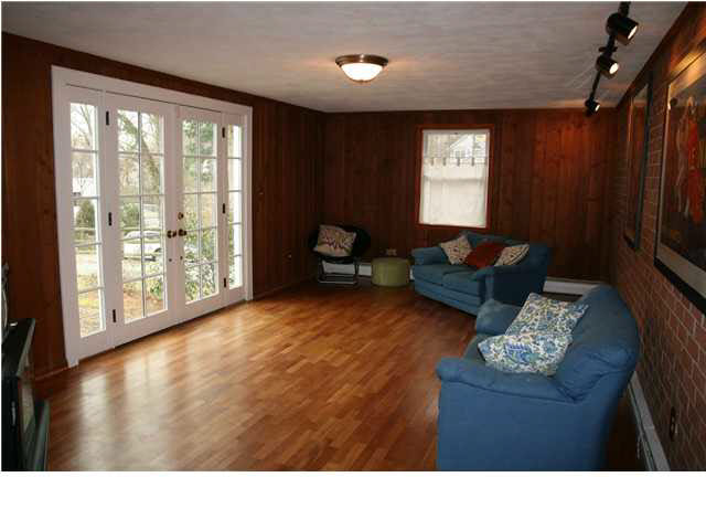 118 Alderman Road Charlottesville, VA 22903 - Photo 8 of 16 a living room with furniture and a window