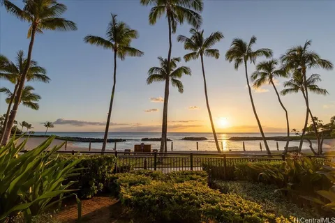 a view of swimming pool with a table and chairs