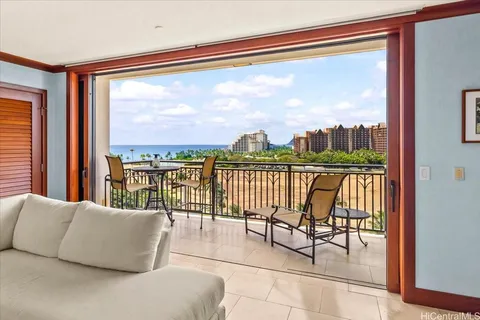 a balcony view with a water view and a ocean view