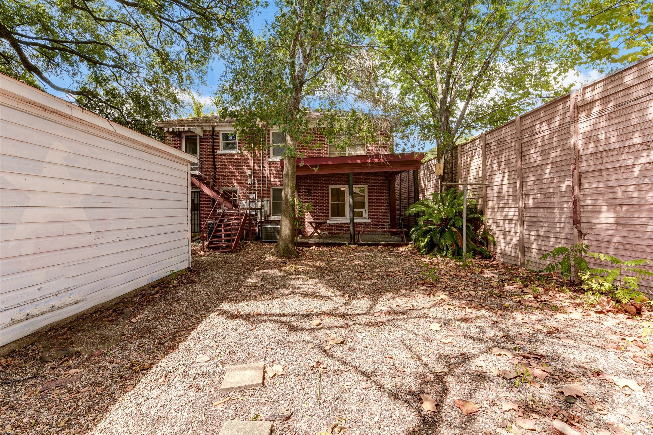 1737 Branard Street Houston, TX 77098 - Photo 29 of 29 Large backyard. New staircase added for private access to unit 2.