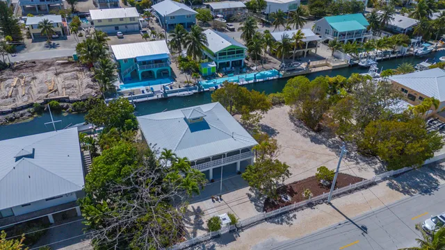 an aerial view of a house with a garden