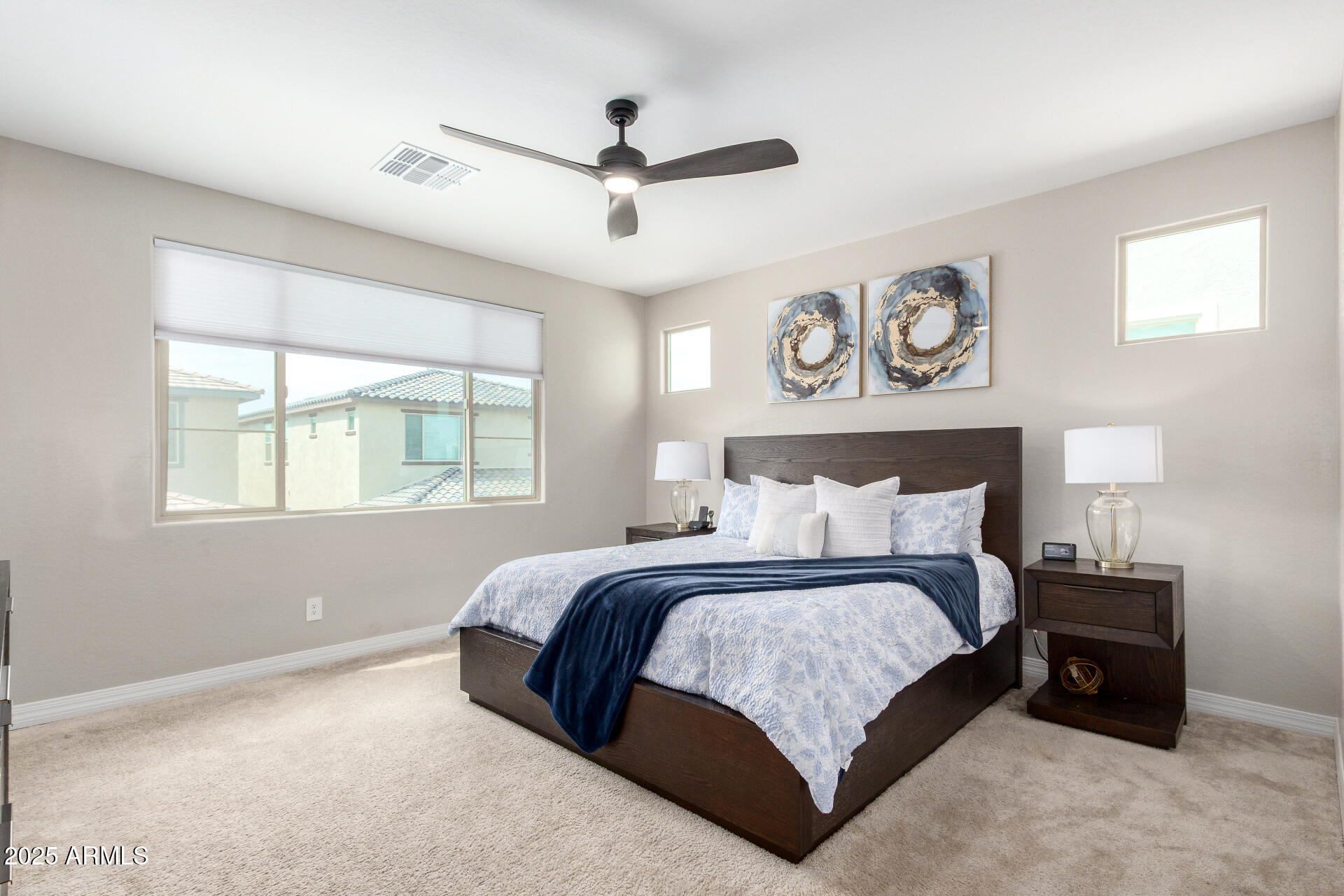 10029 East Tahoe Avenue Mesa, AZ 85212 - Photo 15 of 52 a bedroom with a bed and a window