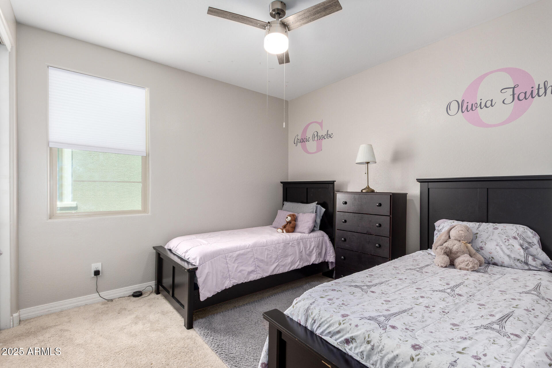 10029 East Tahoe Avenue Mesa, AZ 85212 - Photo 19 of 52 a bedroom with two beds and ceiling fan