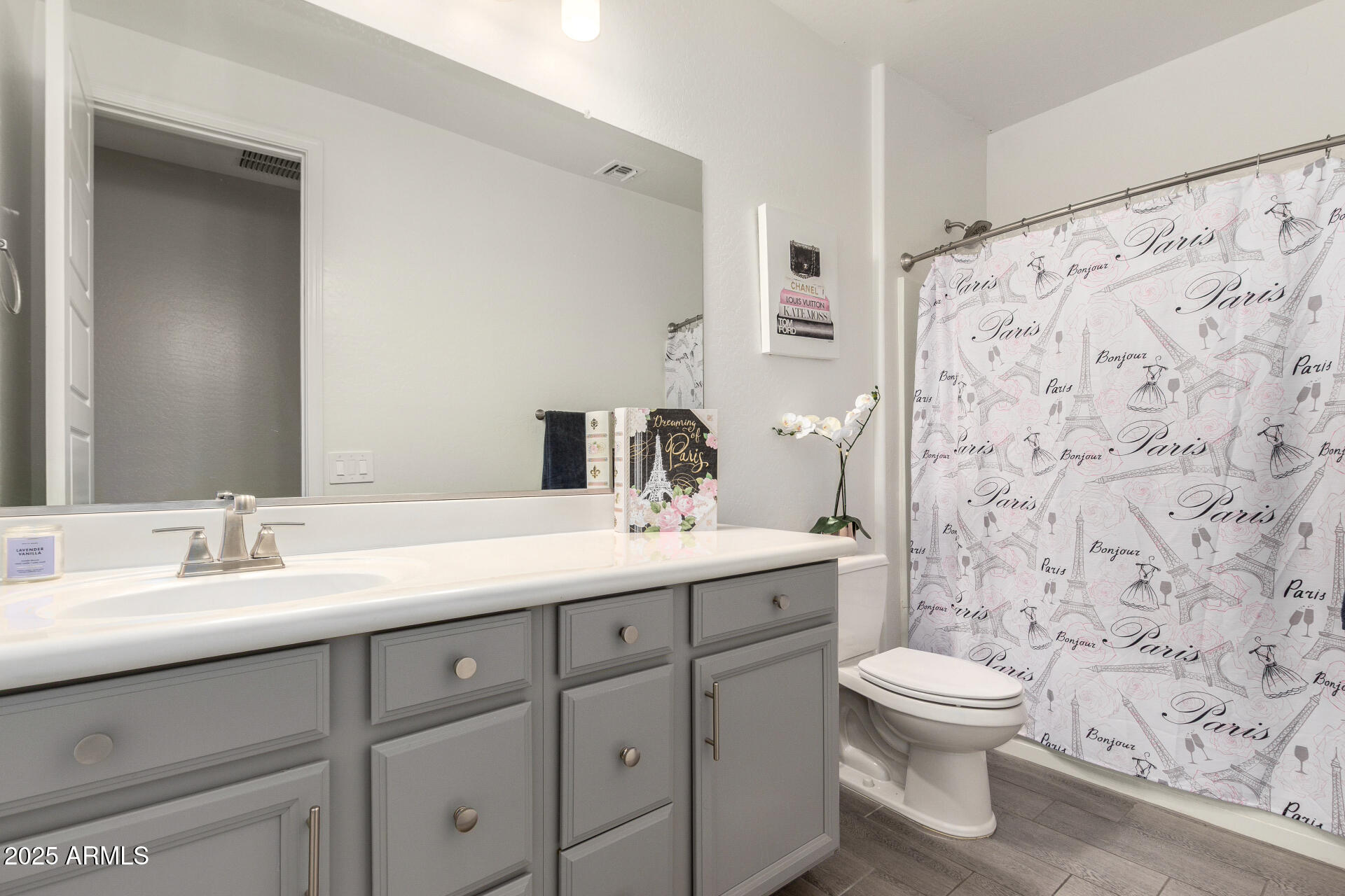 10029 East Tahoe Avenue Mesa, AZ 85212 - Photo 21 of 52 a bathroom with a toilet sink double vanity and shower