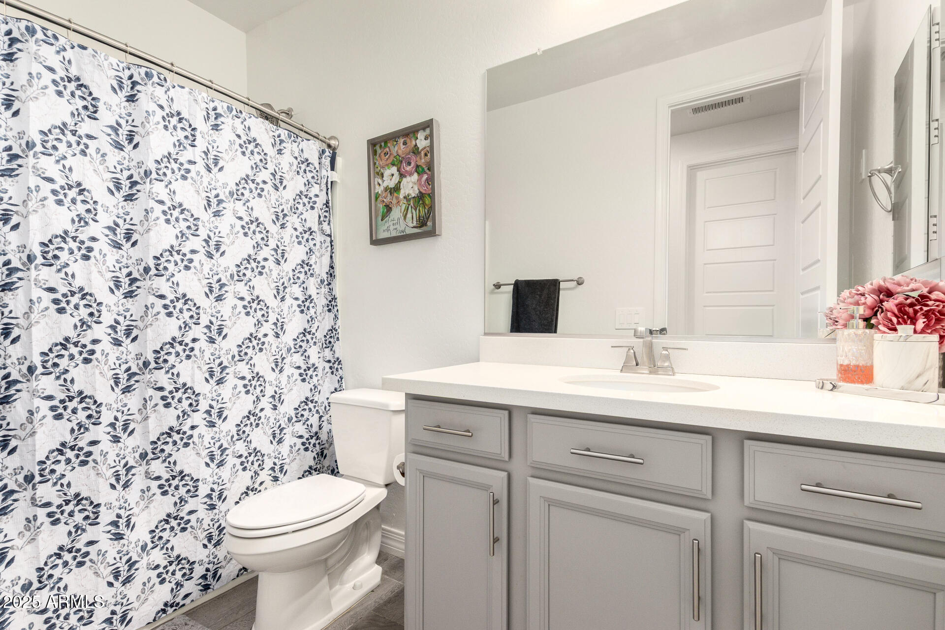 10029 East Tahoe Avenue Mesa, AZ 85212 - Photo 25 of 52 a bathroom with a granite countertop sink and a toilet