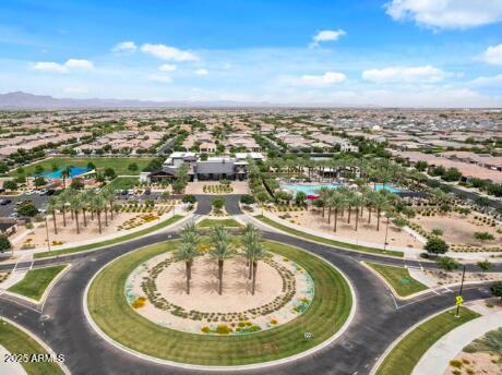 10029 East Tahoe Avenue Mesa, AZ 85212 - Photo 33 of 52 a view of a swimming pool with a lot of buildings