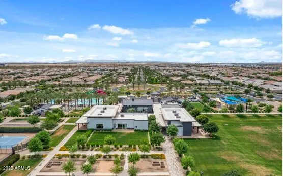a view of a patio with table and chairs and potted plants