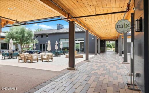 10029 East Tahoe Avenue Mesa, AZ 85212 - Photo 37 of 52 a view of a house with sitting area