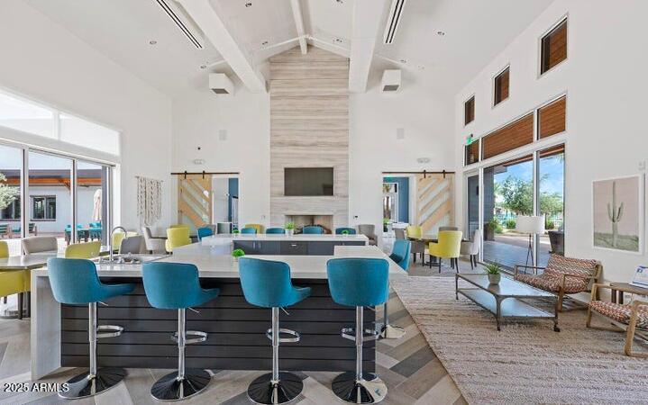 10029 East Tahoe Avenue Mesa, AZ 85212 - Photo 38 of 52 a view of a dining room with furniture window and outside view