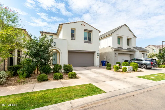 a front view of a house with yellow lighting