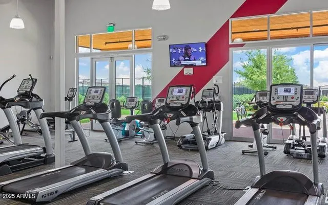 a childrens park with lots of swings and slides