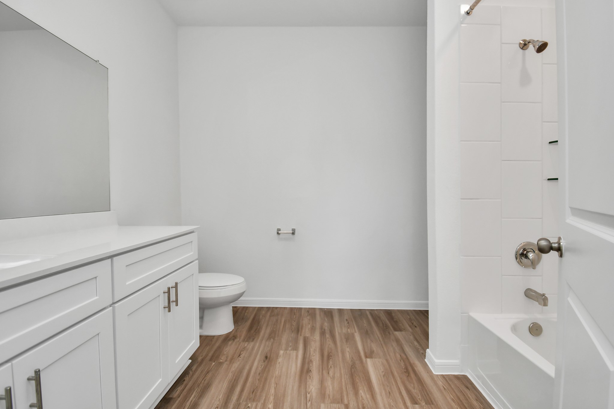 16150 Elbridge Court Conroe, TX 77302 - Photo 15 of 46 Master bathroom features a tub/shower combination.
