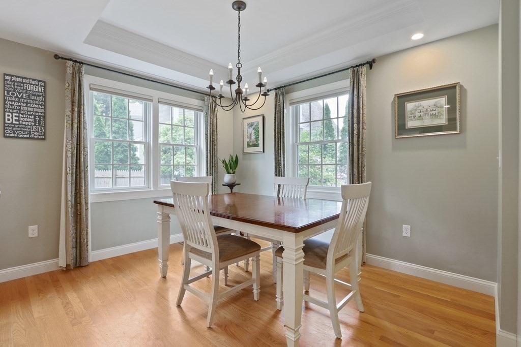 60 Colby Street Needham, MA 02492 - Photo 17 of 41 a view of a dining room with furniture window and wooden floor