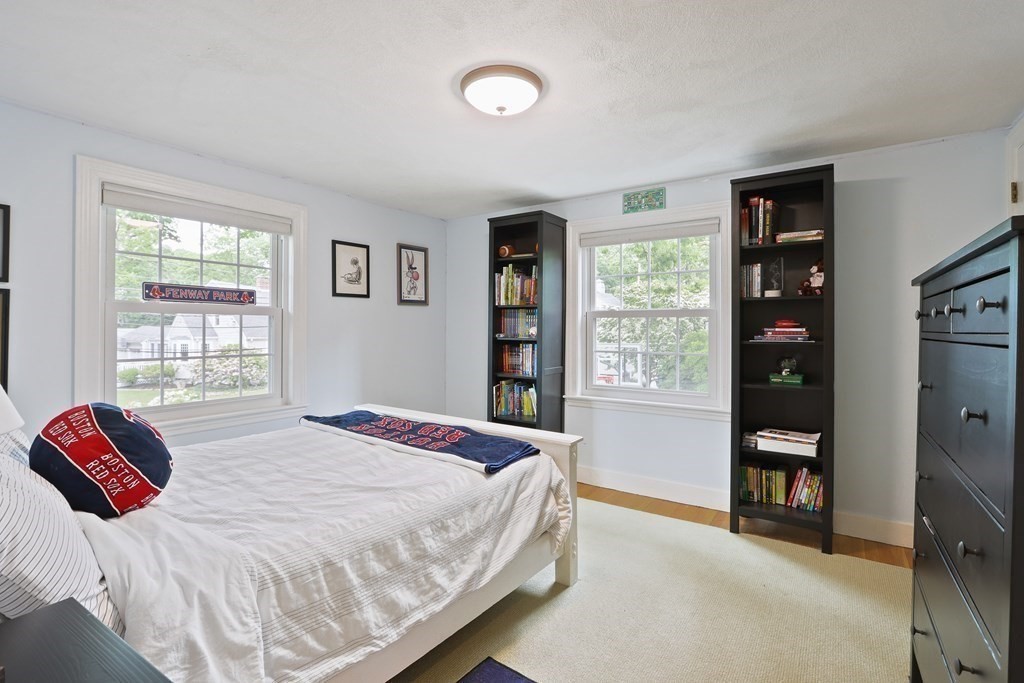60 Colby Street Needham, MA 02492 - Photo 27 of 41 a bedroom with a bed and a window