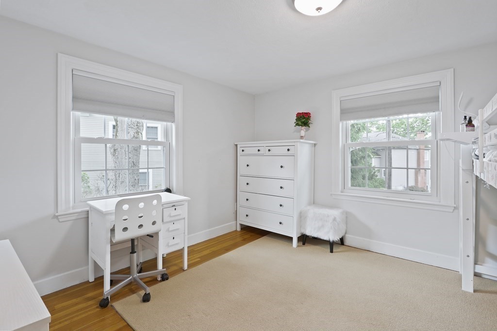 60 Colby Street Needham, MA 02492 - Photo 30 of 41 a bed room with a bed and a window